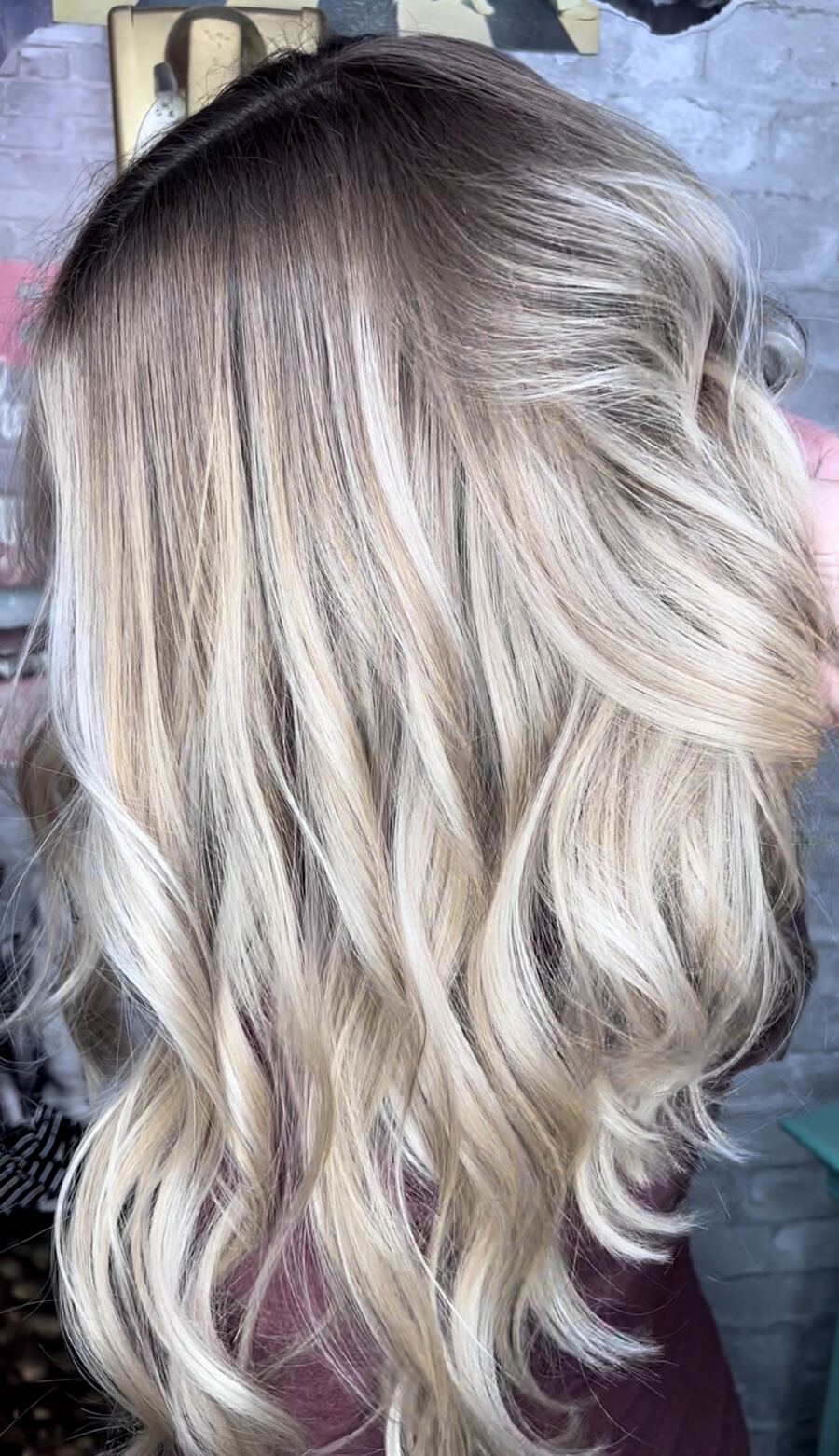 Cool ash blonde balayage with root melt
